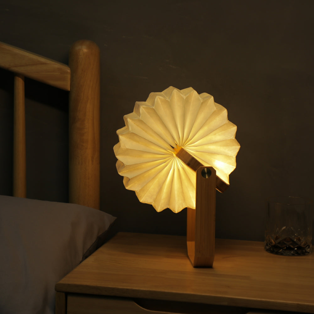 Lamp on bedside table.