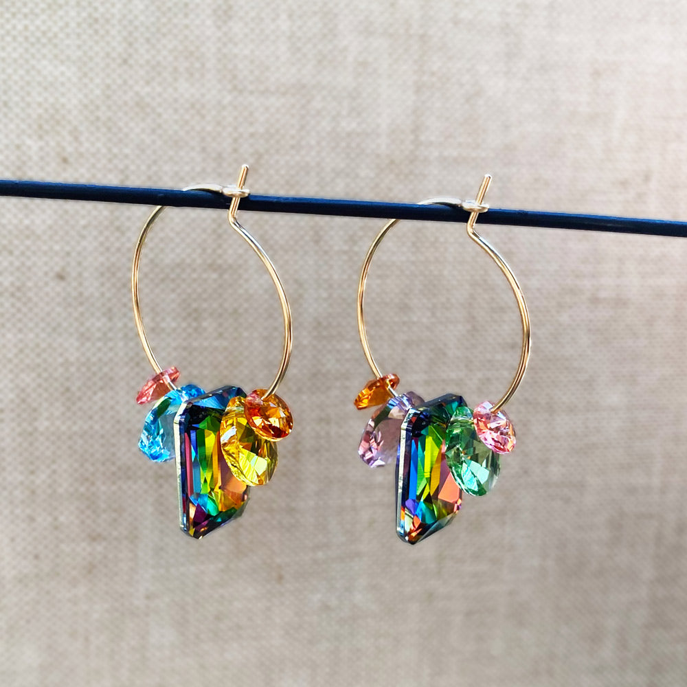 Earrings hanging on wire lifestyle photo.