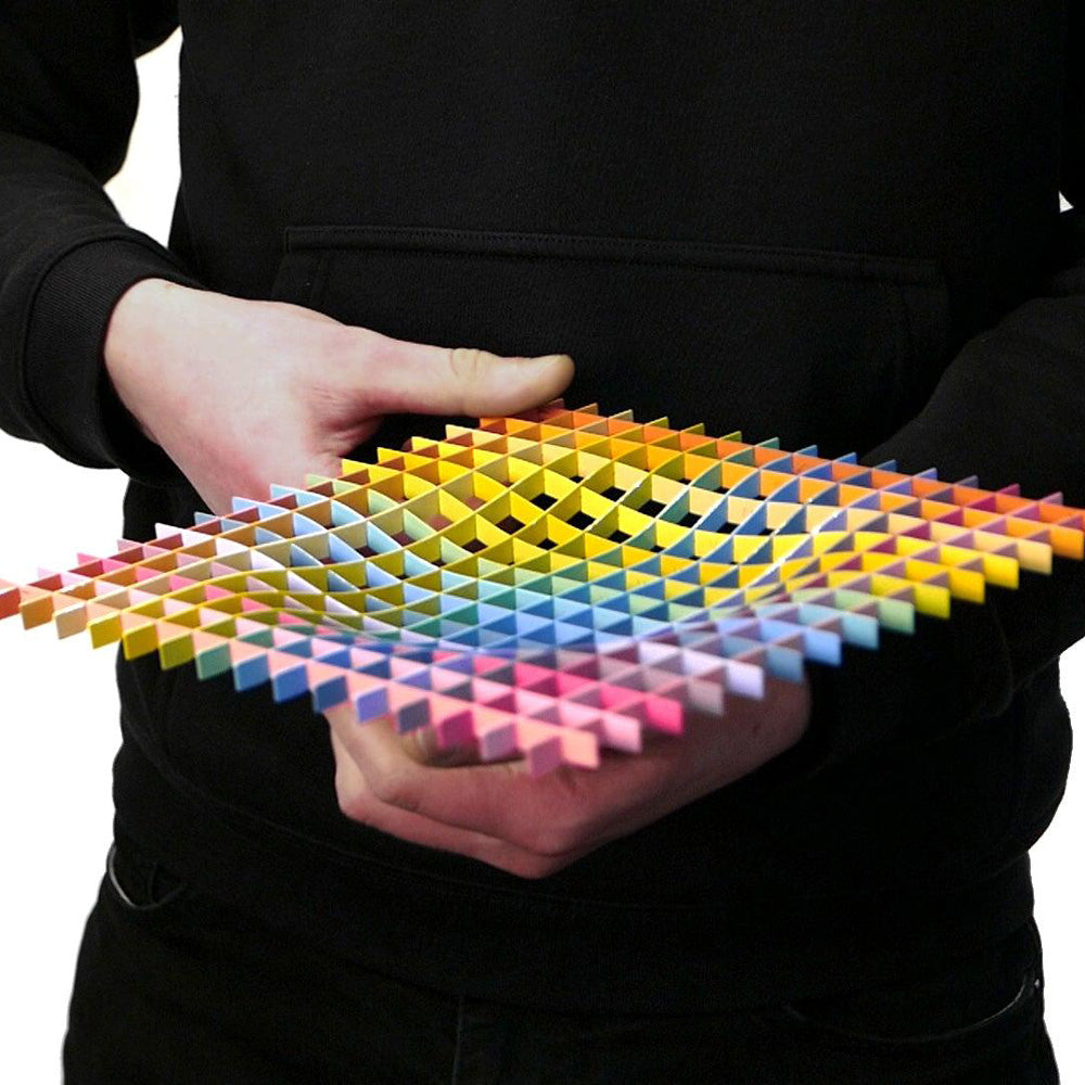 Model holding a Spectrum Tray.