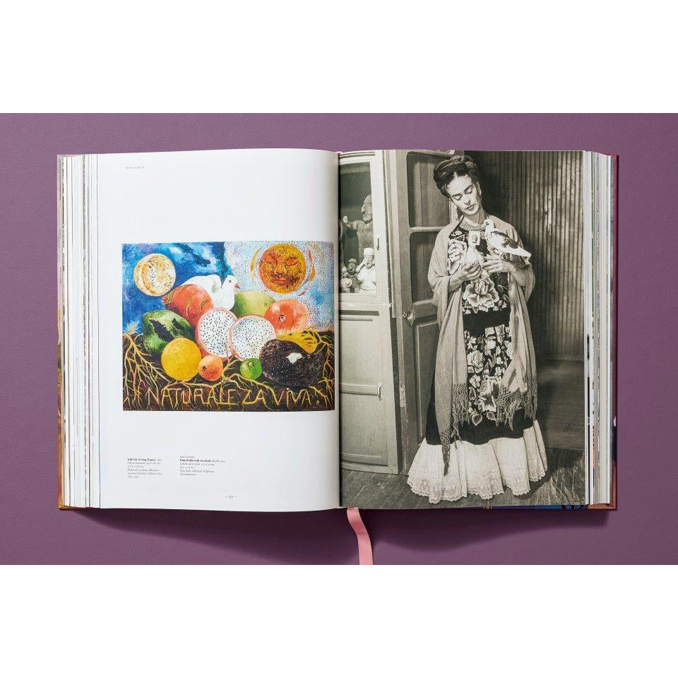 Frida Kahlo: The Complete Paintings photo and painting pages.