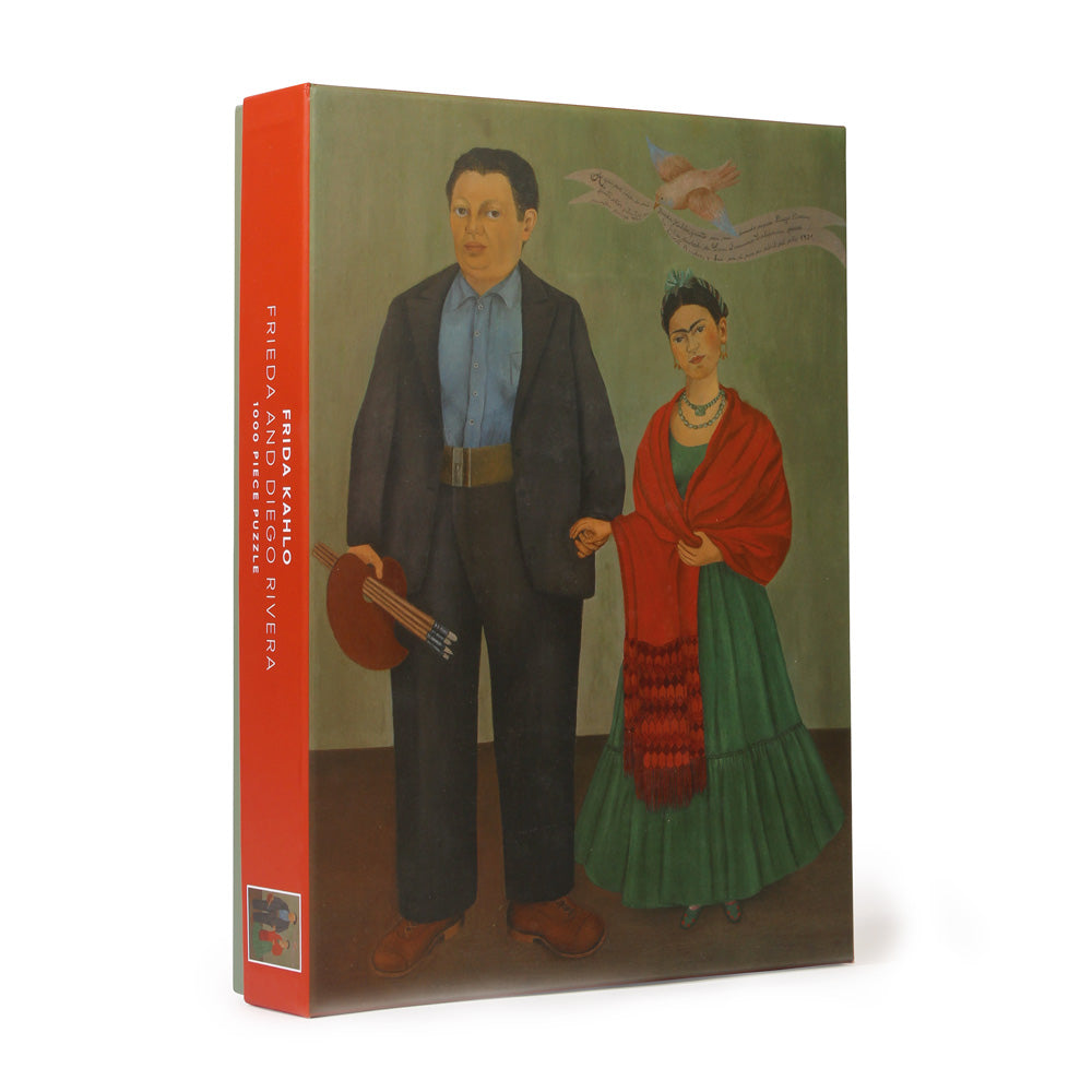 Box with an image of Frida Kahlo&#39;s painting &#39;Frieda and Diego Rivera&#39;; Contains puzzle of same image.