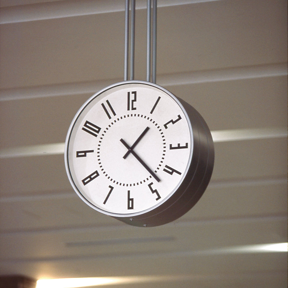 A train station clock hanging from the ceiling, the inspiration for the Eki Sapporo Station Clock.