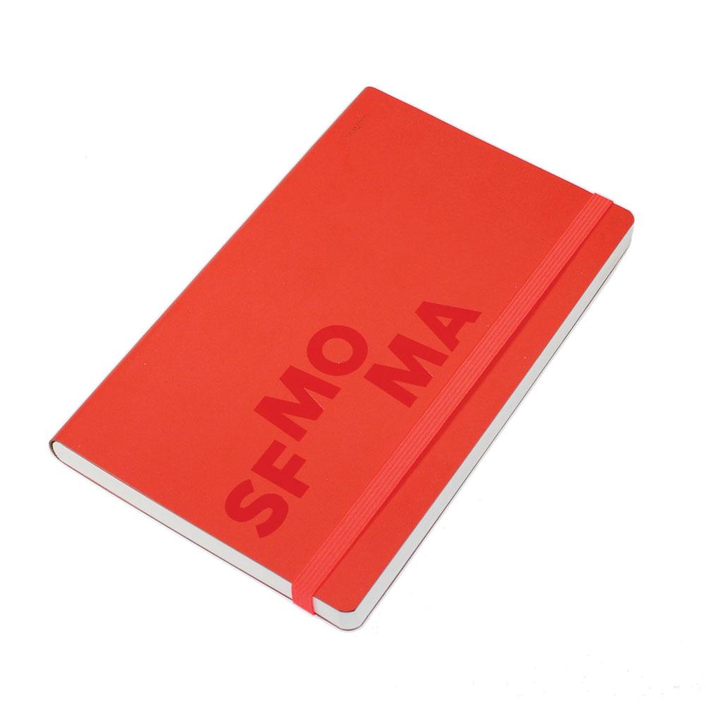 Three SFMOMA Red Notebook: Mediums stacked on top of each other.