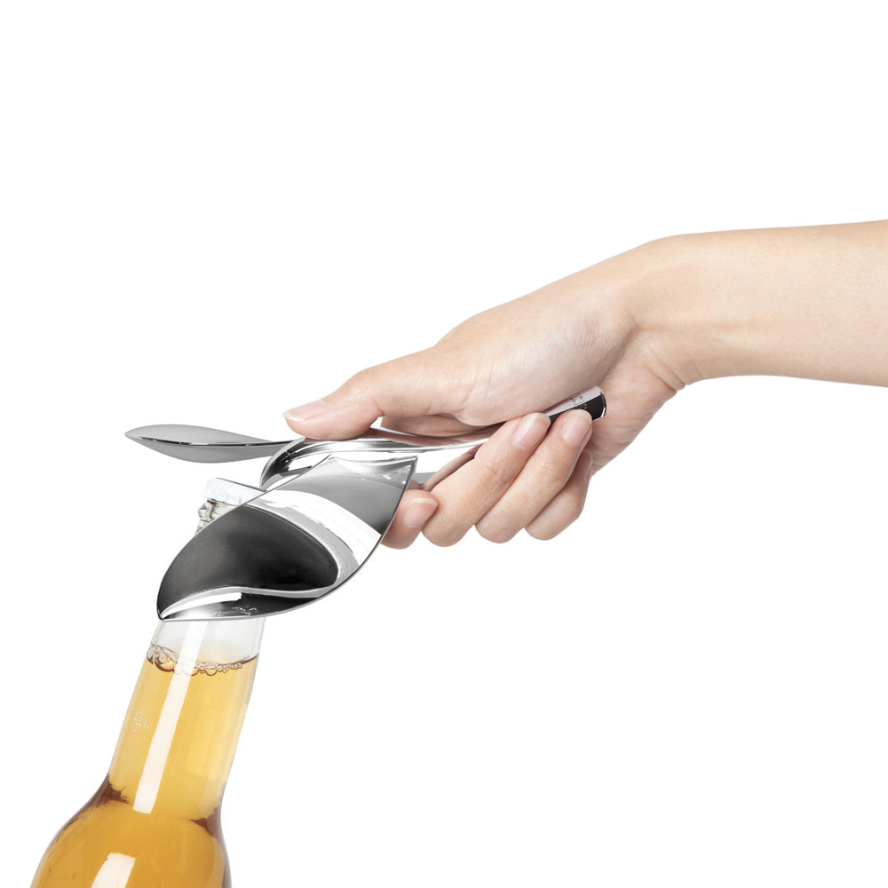 Close-up model opening bottle with opener.
