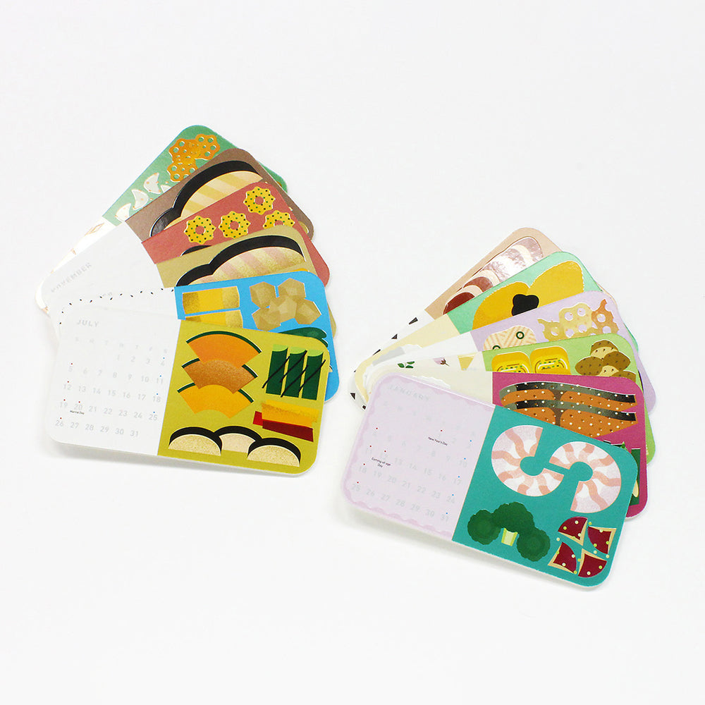 Colorful monthly calednar cards with illustrations on a white background