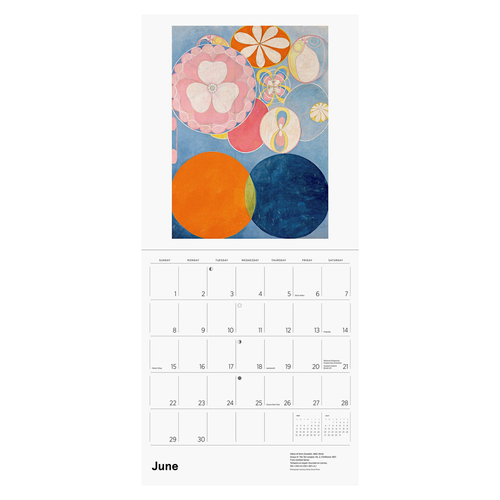 Interior of wall calendar with artwork and June month grid.