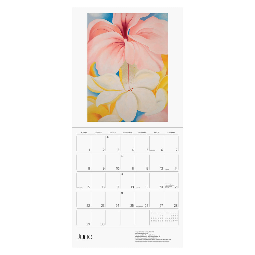 Interior of wall calendar with artwork and June month grid.