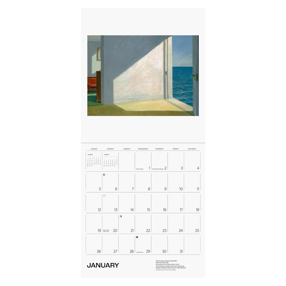 Interior of wall calendar with artwork and January month grid.