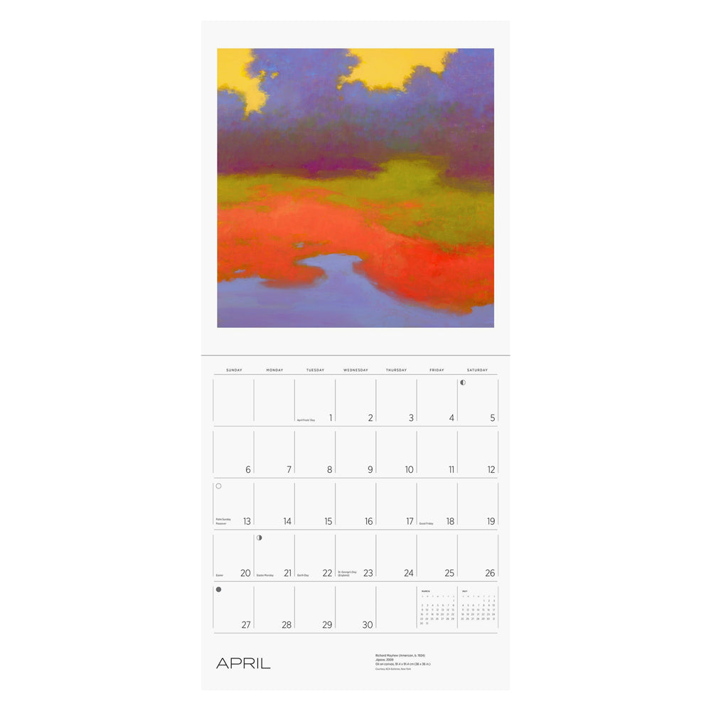 Interior of wall calendar with artwork and April month grid.