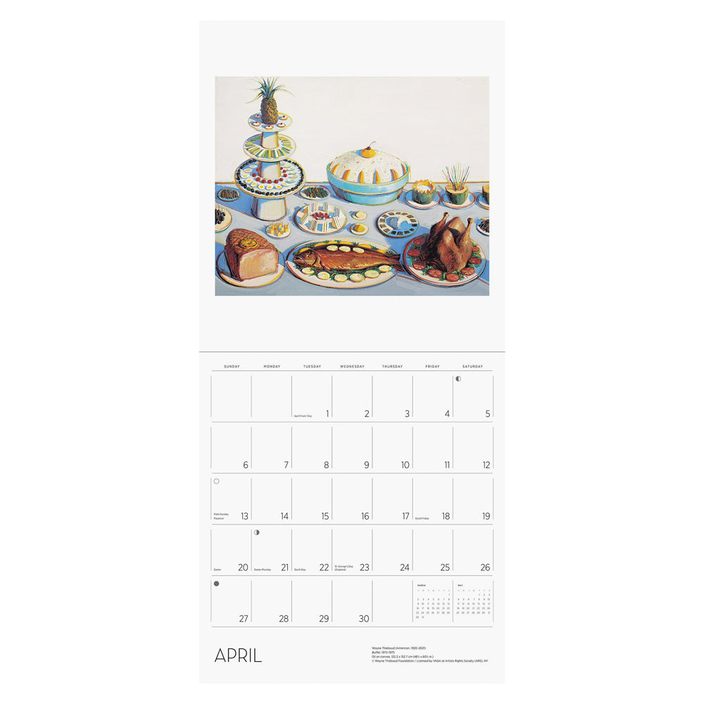 Interior of wall calendar with artwork and April month grid.