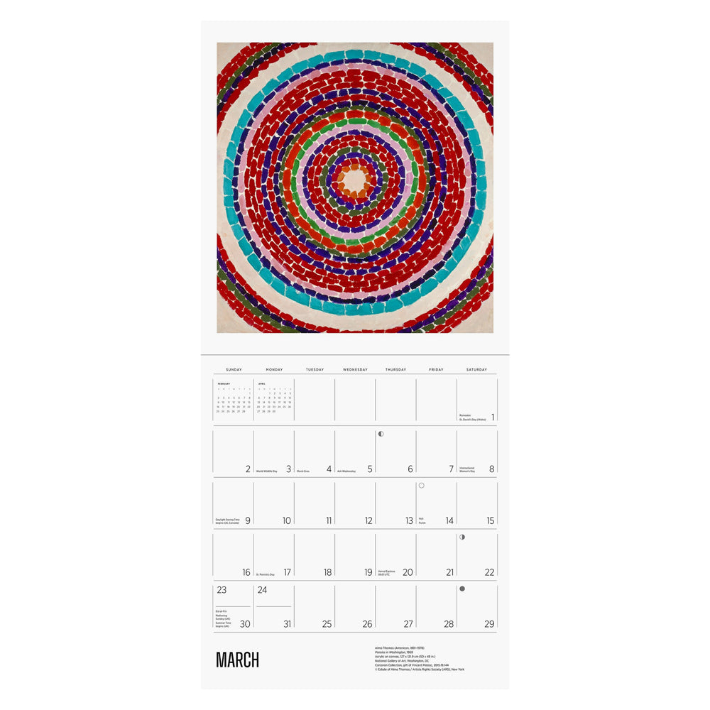 Interior of wall calendar with artwork and March month grid.