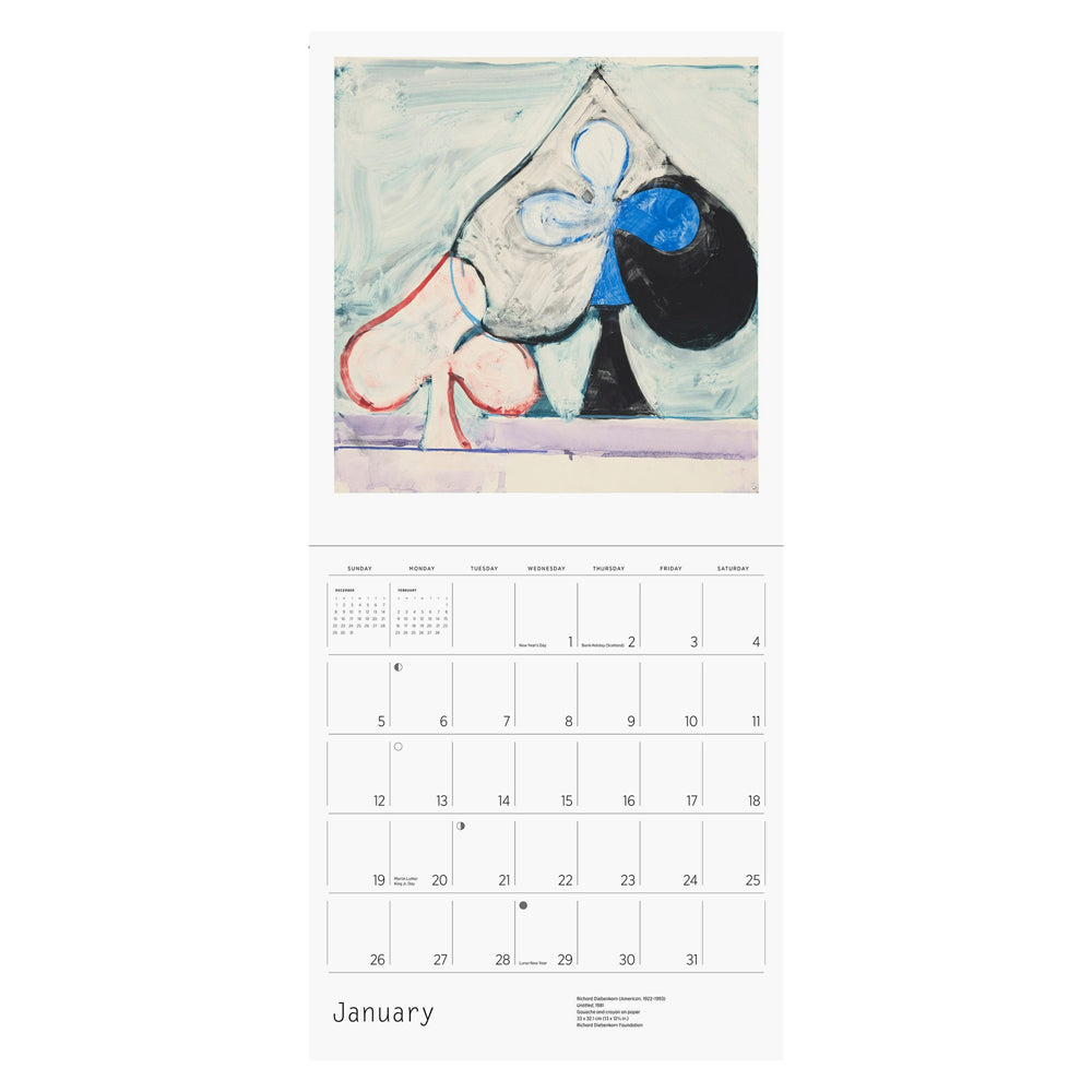 Interior of wall calendar with artwork and January month grid.