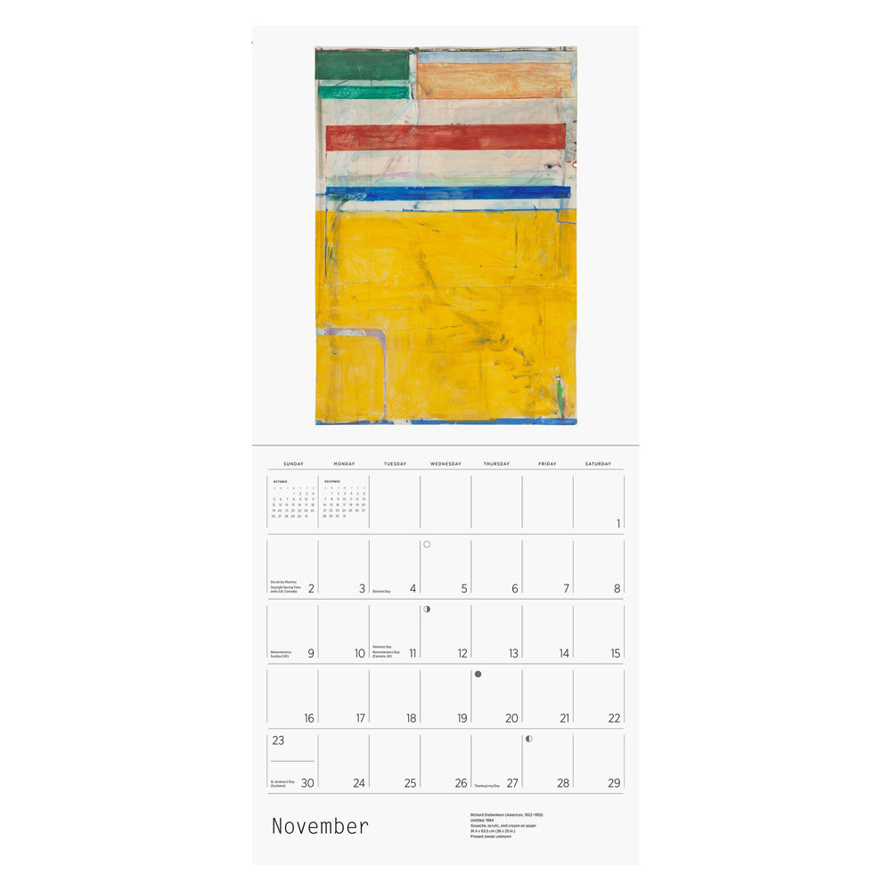 Interior of wall calendar with artwork and November month grid.