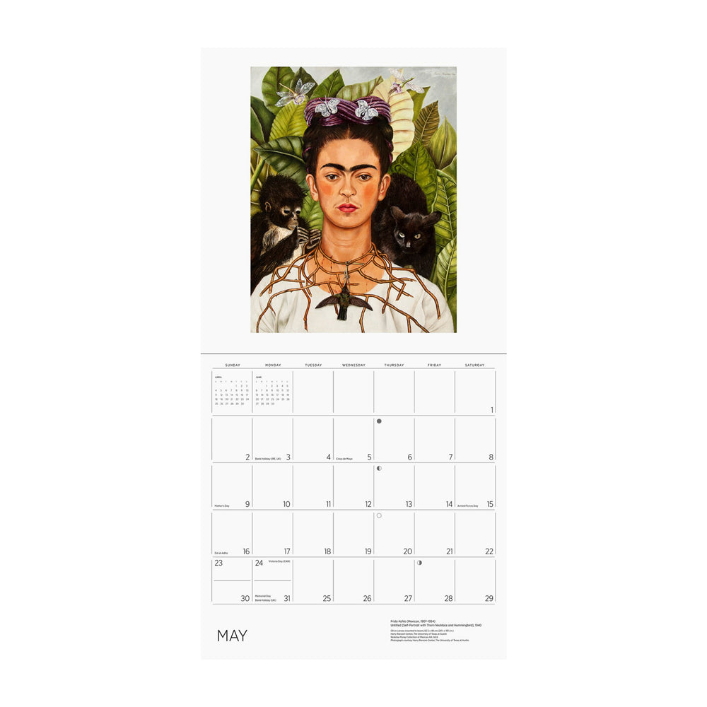 Calendar page for May featuring a painting of Frida with a black cat, a monkey and surrounded by green leaves. 