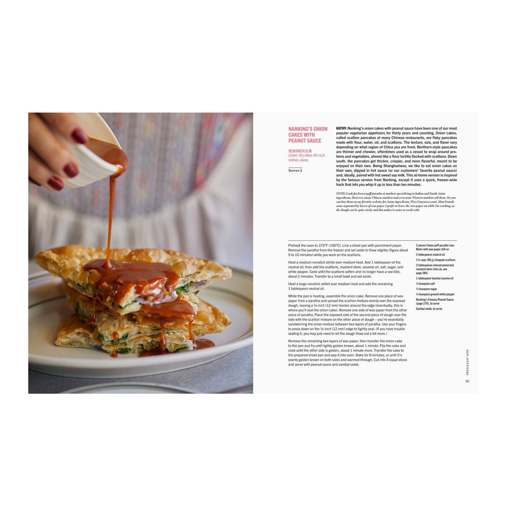 Interior pages featuring text and a photograph of a stack of food being drizzled with sauce on a plate.