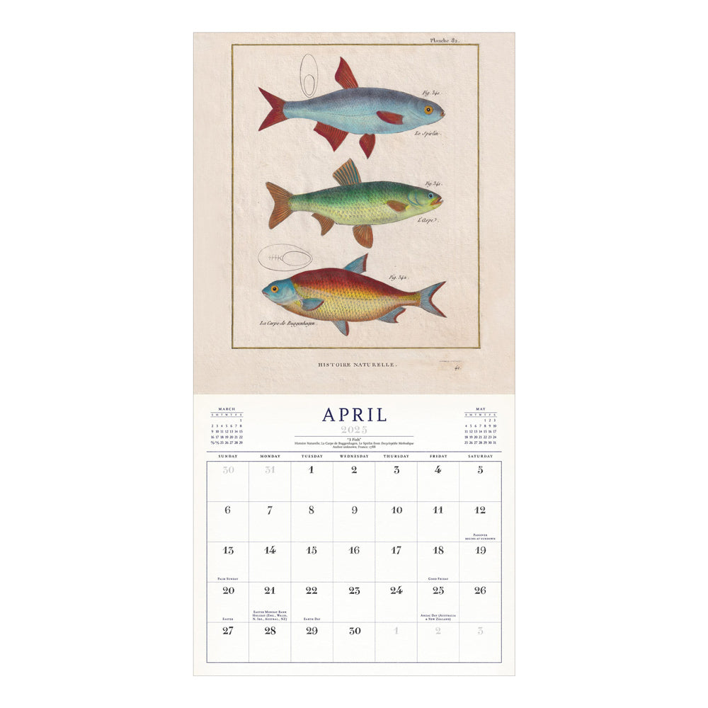 Interior of wall calendar with artwork and April month grid.