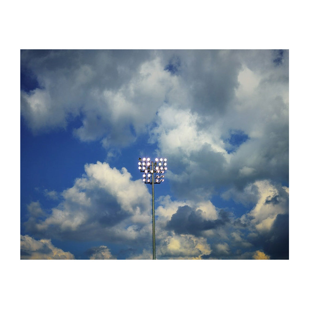 Interior page; image of sky and stadium lights.