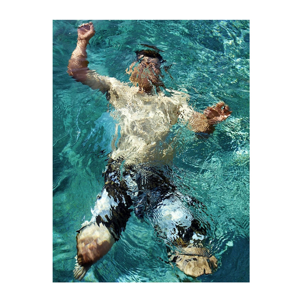 Interior page; image of a person underwater.