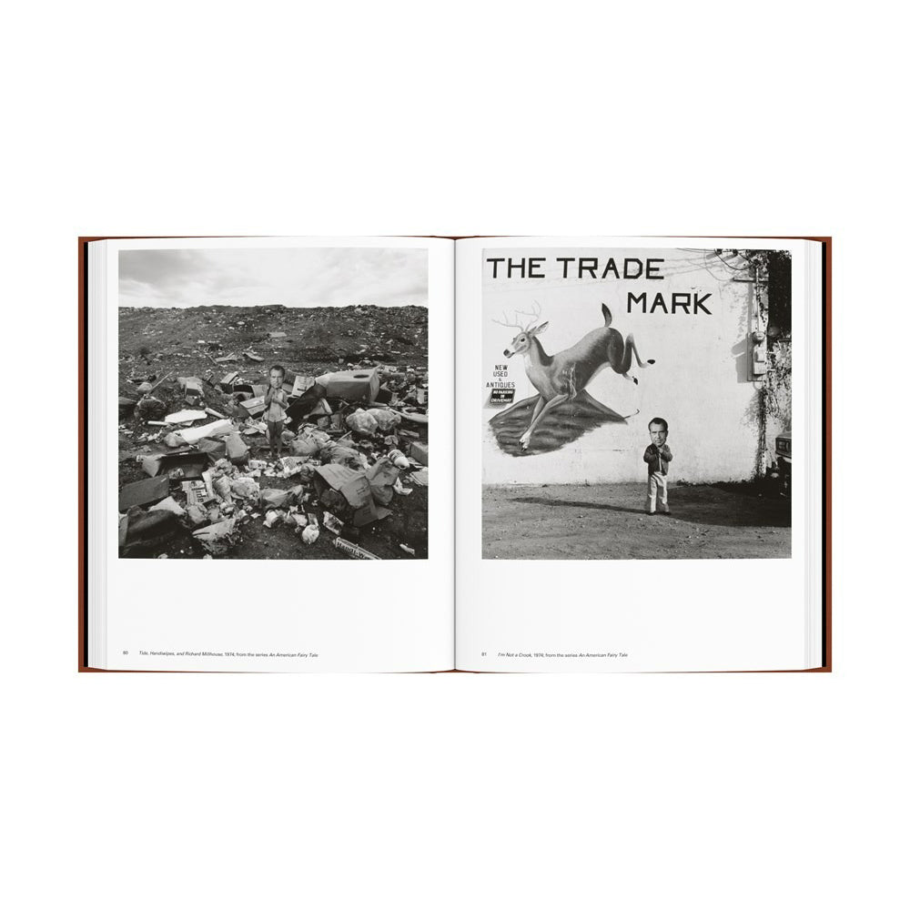 Interior spread; black and white photographs and text. 