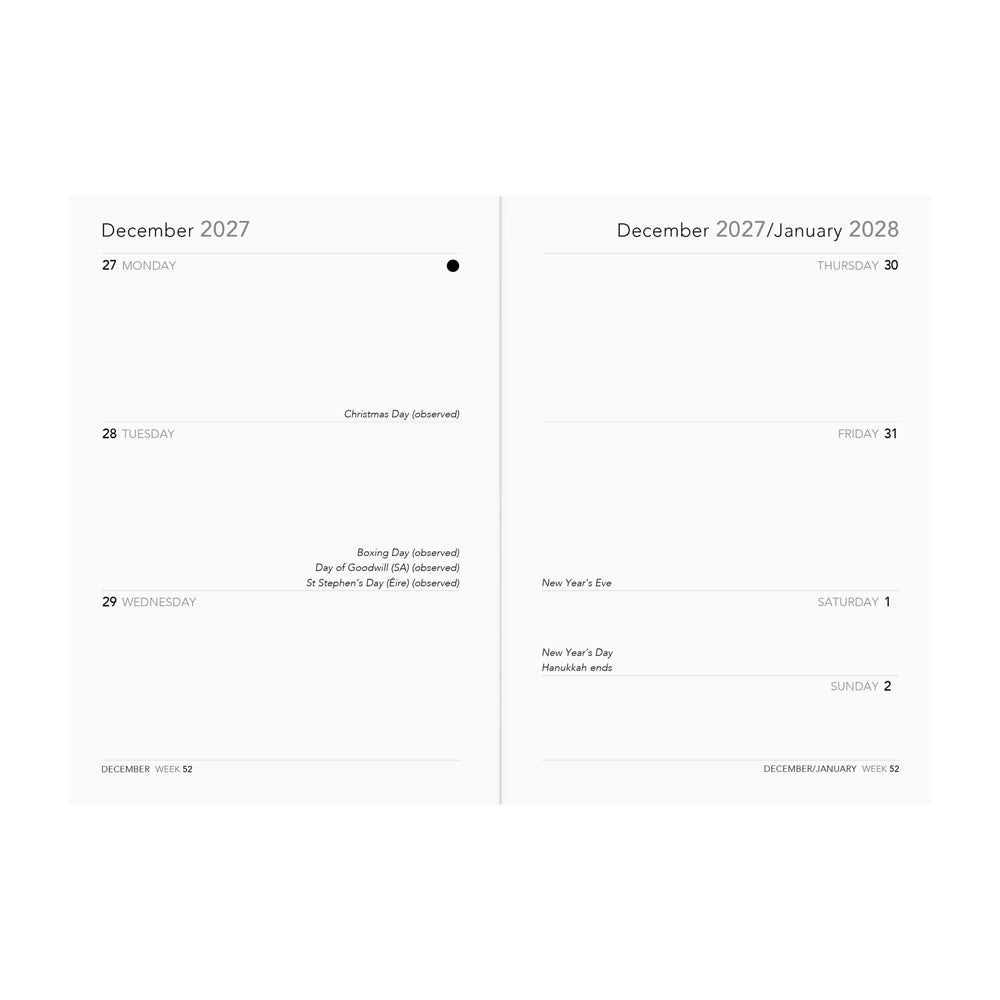 Interior spread: Left and right pages featuring a calendar grid with horizontal lines for a week in December.