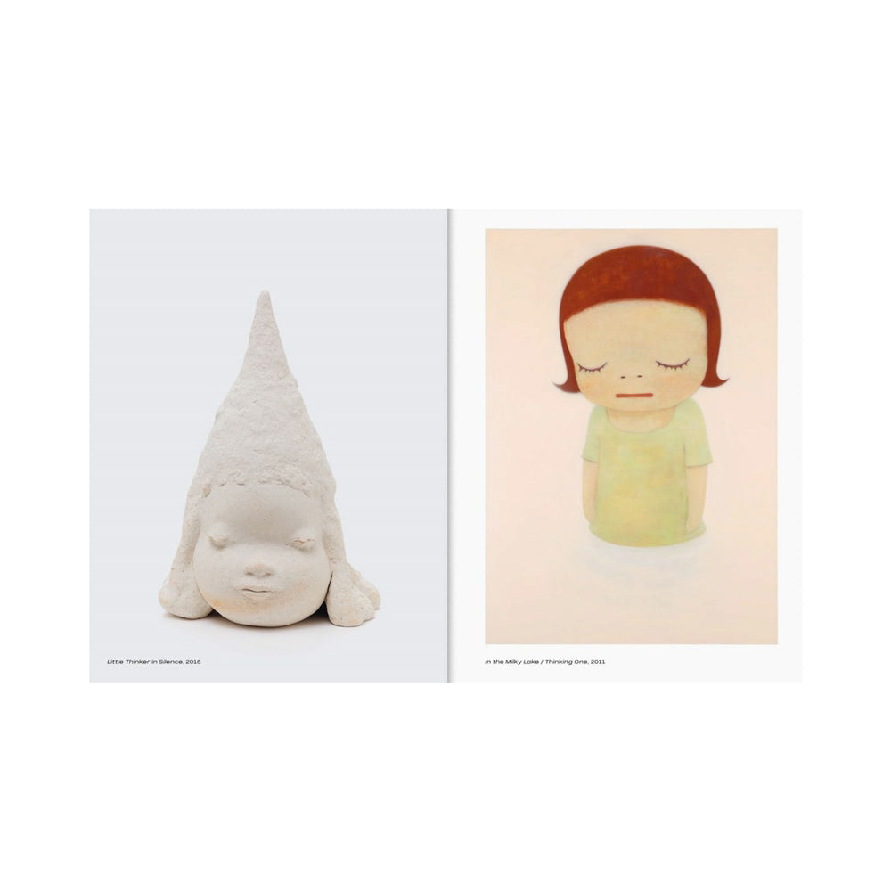 Interior pages featuring a photograph of a sculpture and a illustration of woman with red hair.