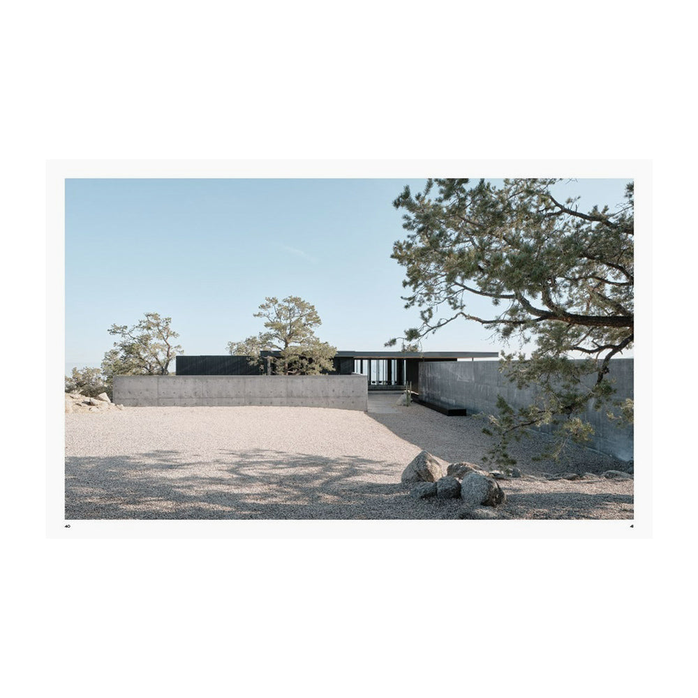 Interior spread; Image of home in desert.