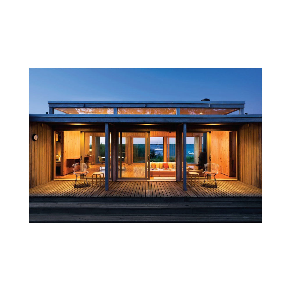 Interior page featuring a modern house exterior with a deck and outdoor furniture at dusk.