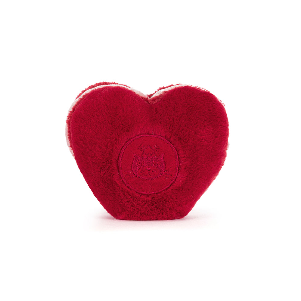 Red heart-shaped object with a logo on a white background (back view)