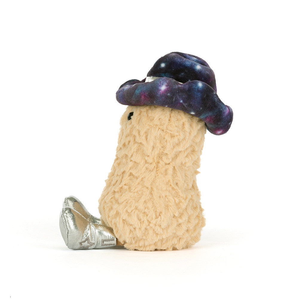 Toy figure of a character with a galaxy-patterned helmet and silver shoes on a white background