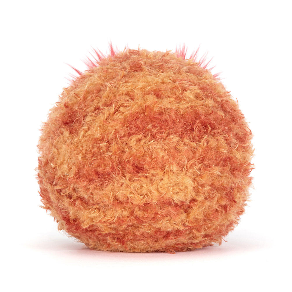 Orange textured ball on a white background (back view)