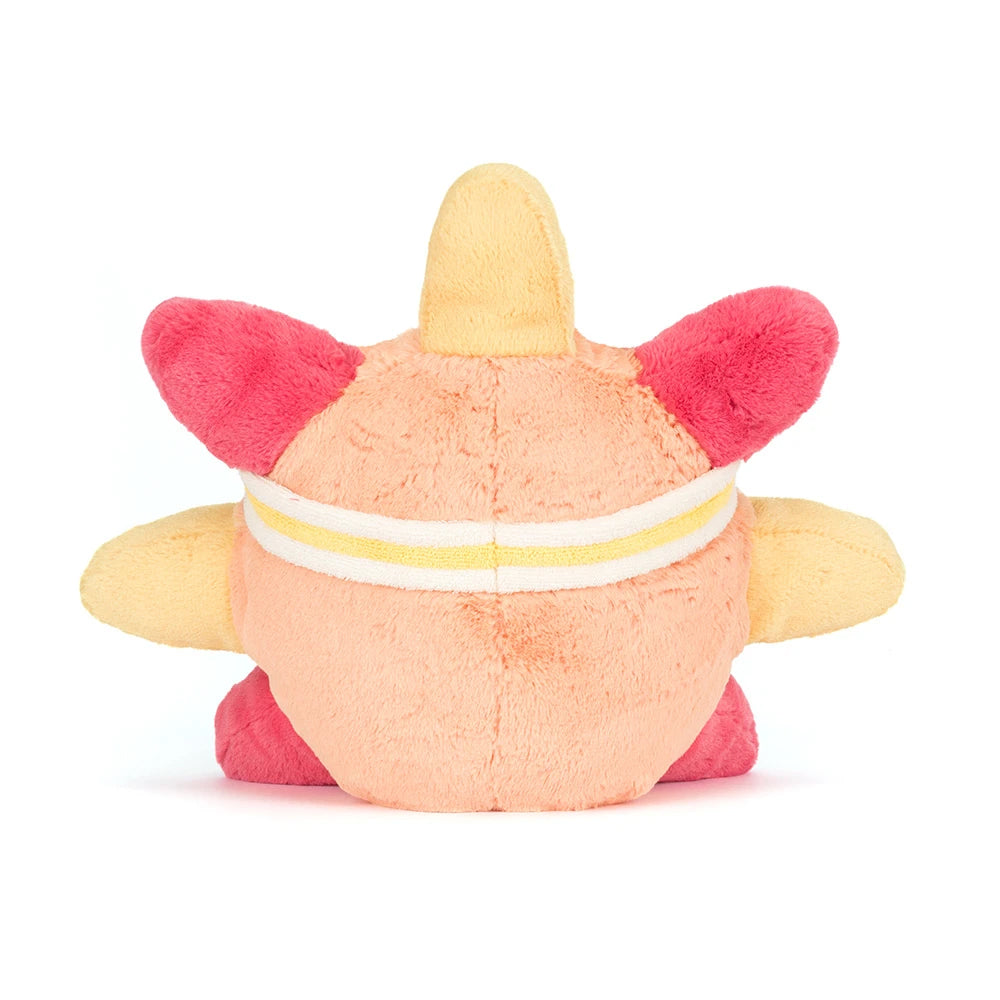 Rear view; plush toy resembling a sun with pink and yellow colors on a white background