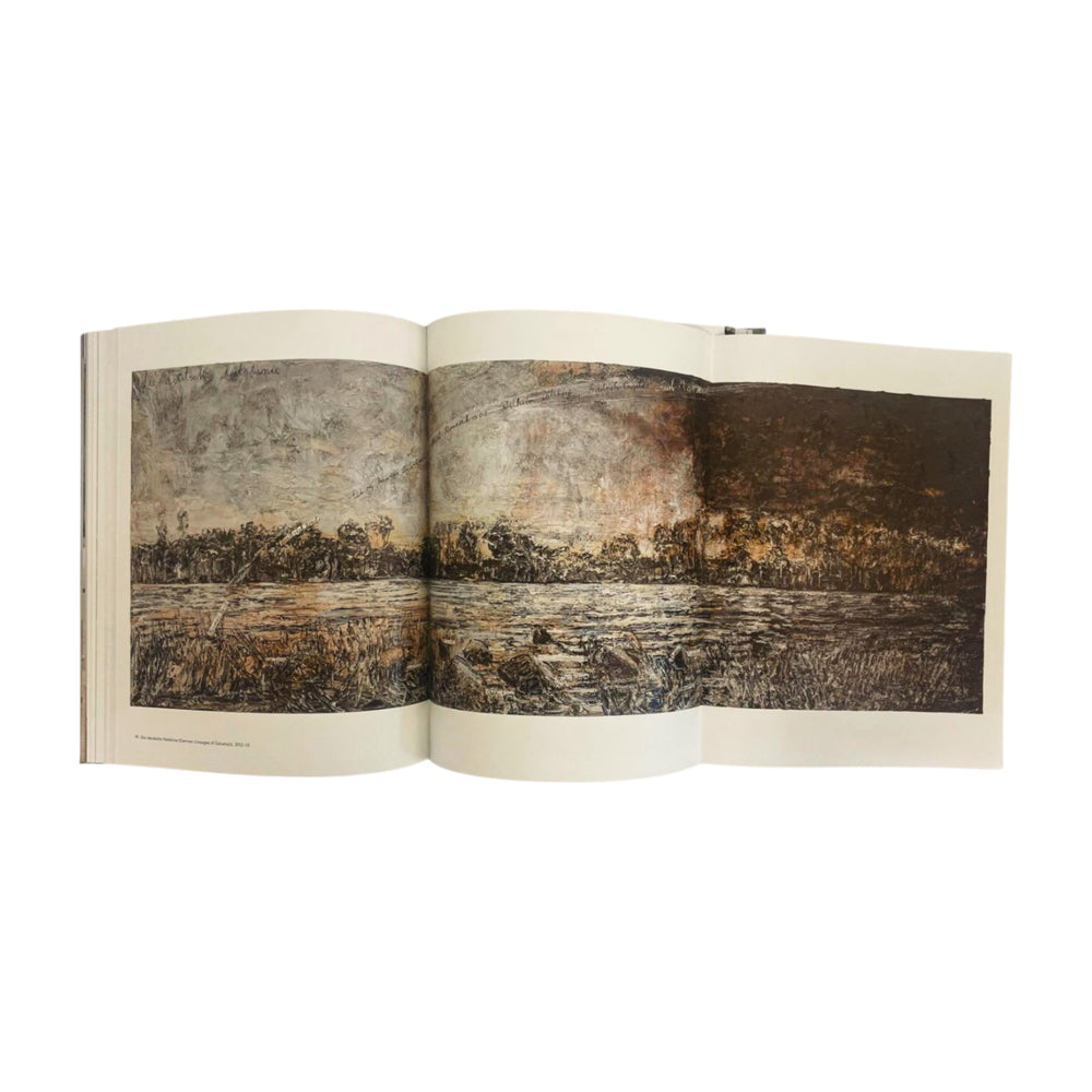 Open book displaying a detailed landscape illustration on a white background
