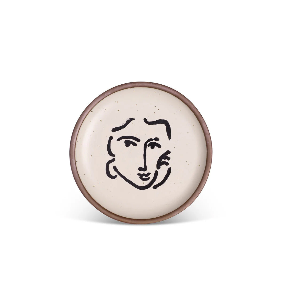 Round ceramic plate with a black line drawing of a face on a white background