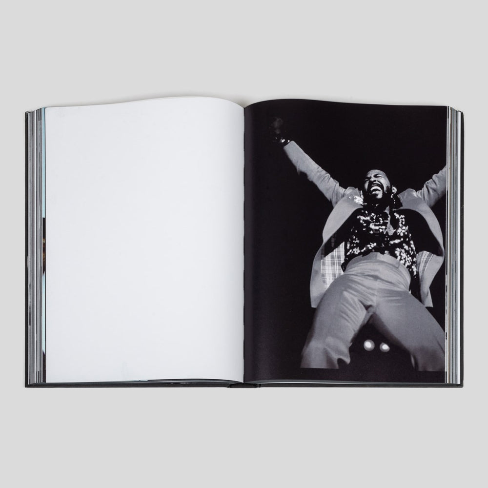 Book titled 'EVIL' with a black and white portrait on the cover