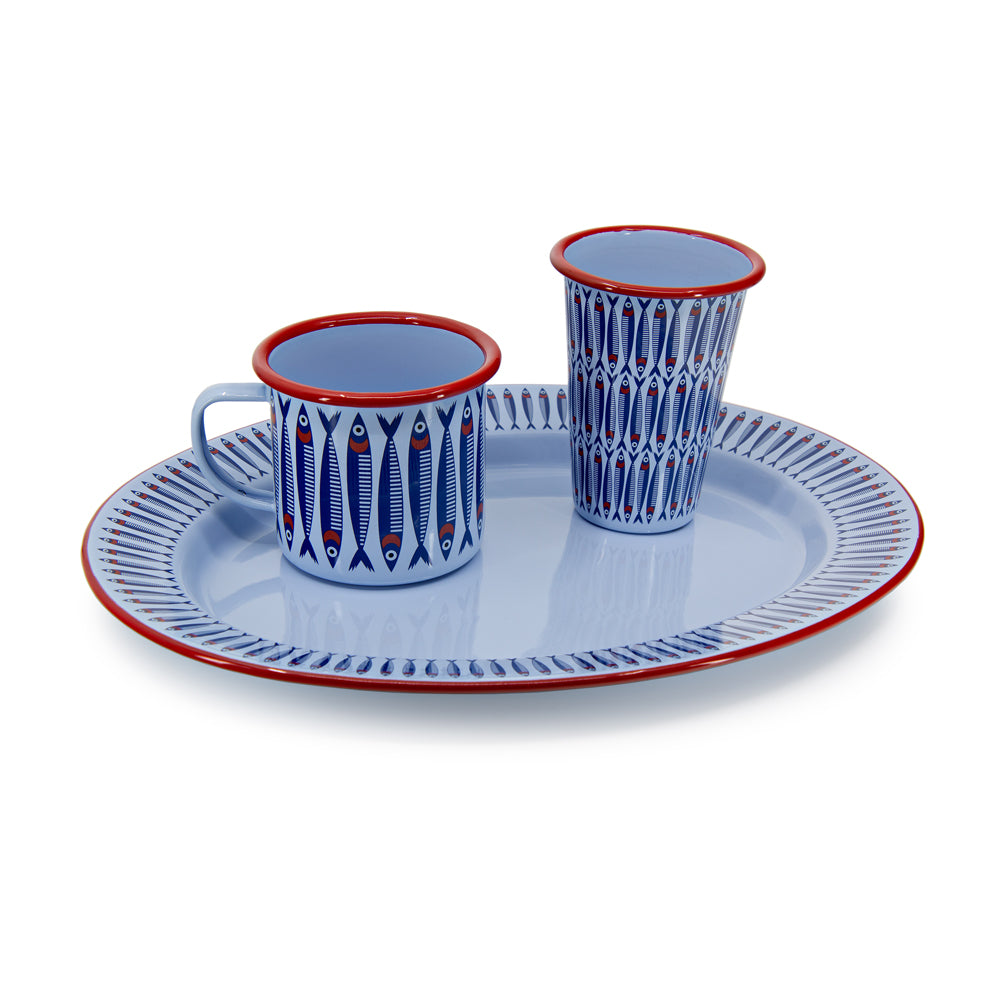 Blue oval plate with decorative border on a white background