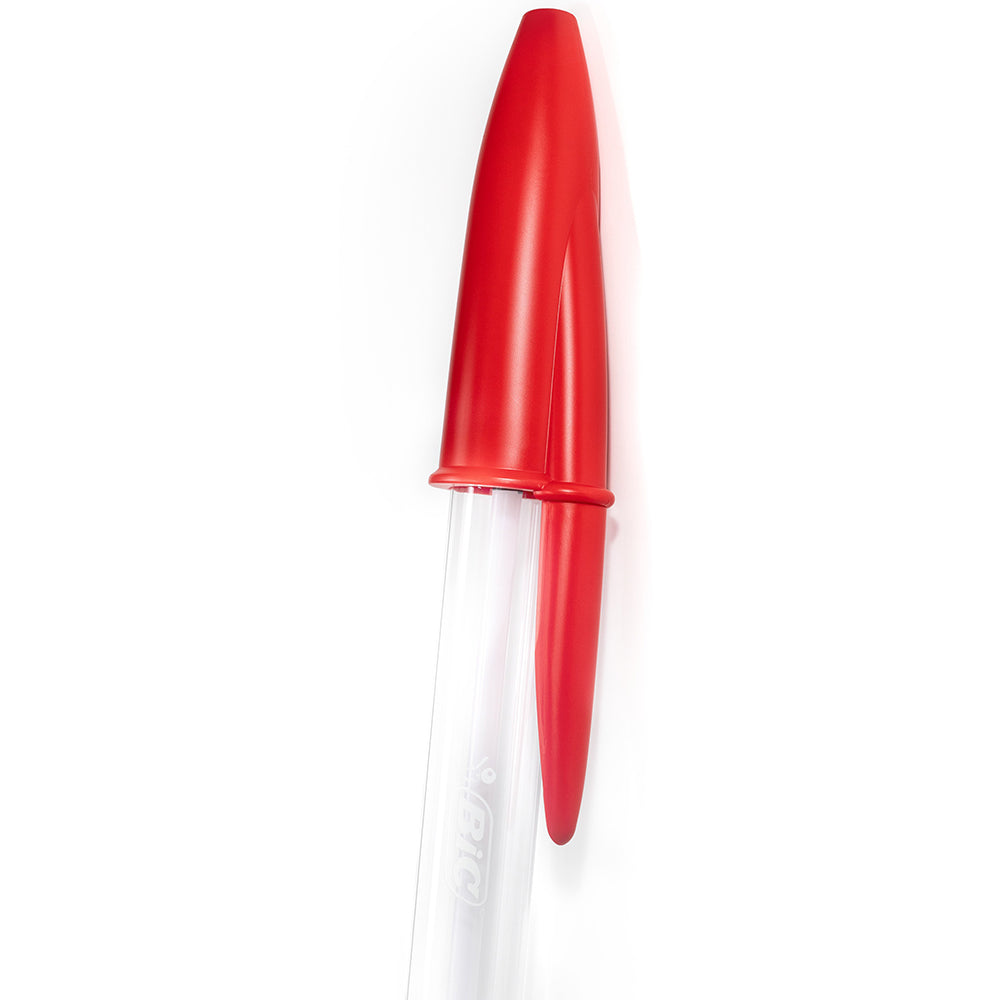 Red and clear plastic tool on a white background