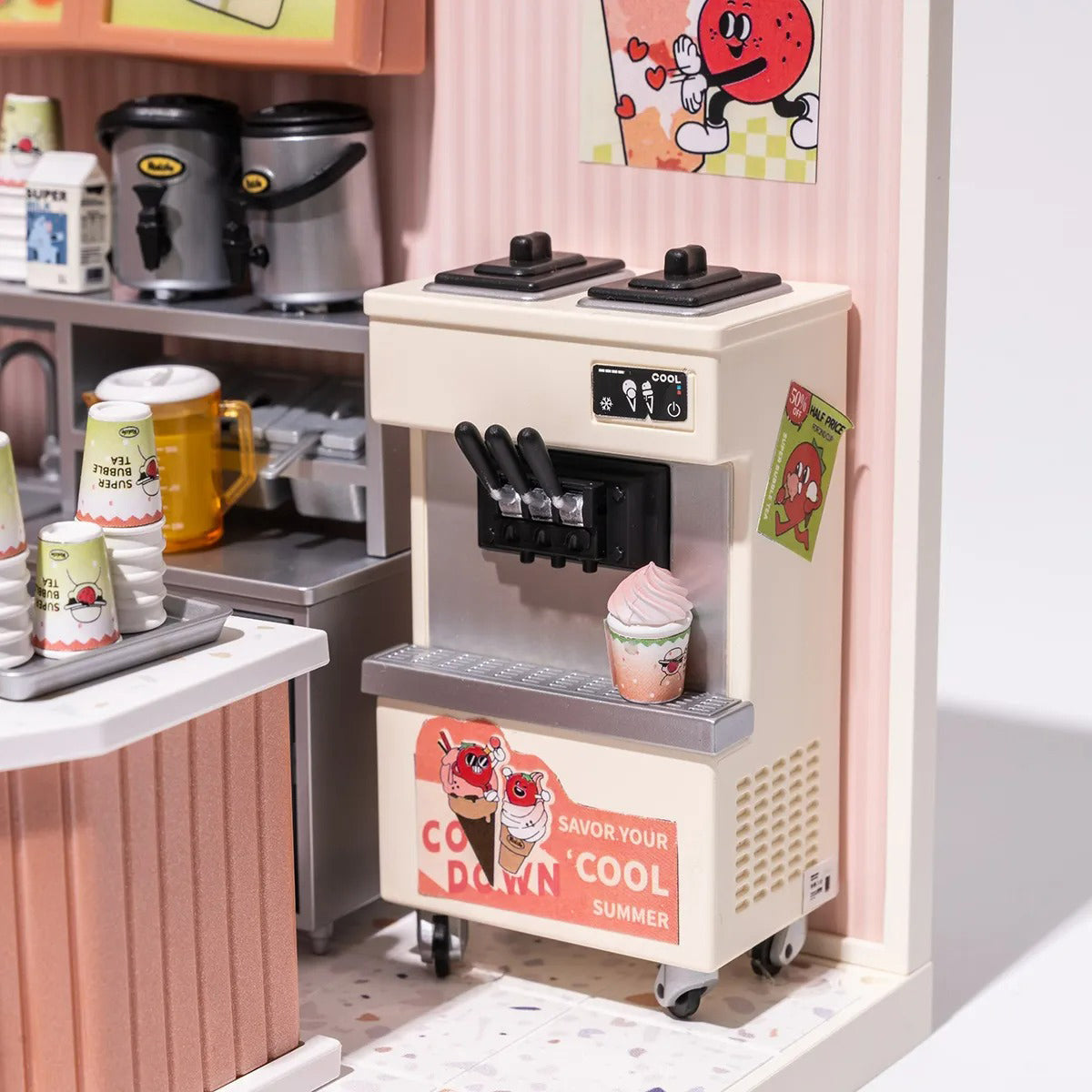 Close up of miniature ice cream machine.