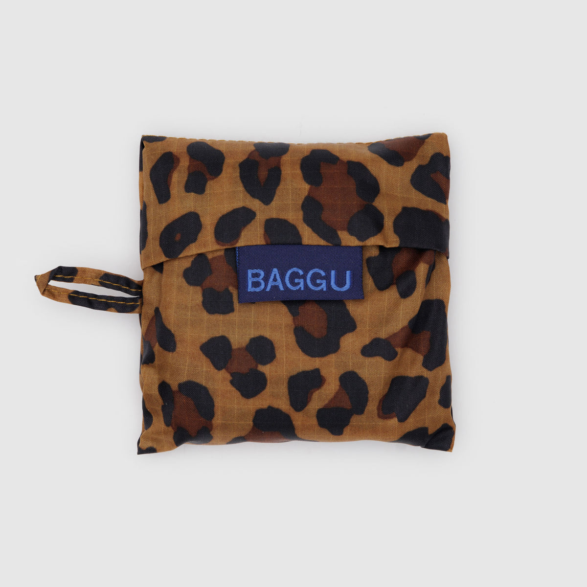 Leopard print bag with a blue 'BAGGU' label on a white background