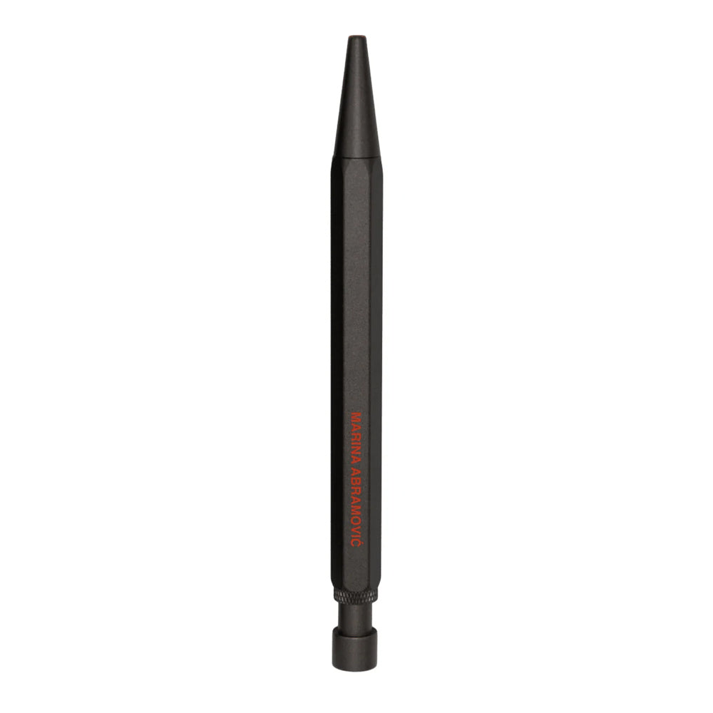 A black pen with the text " Marina Abramovic " shown against a plain white background.