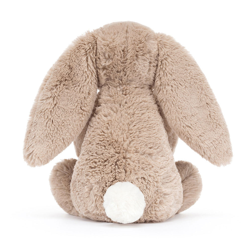 Plush bunny toy with long ears on a white background