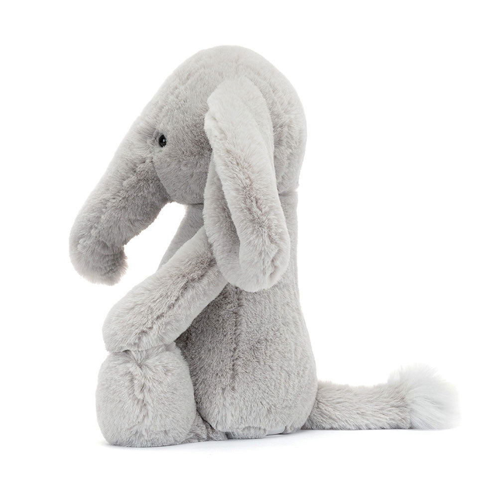 Side view of Gray stuffed elephant.