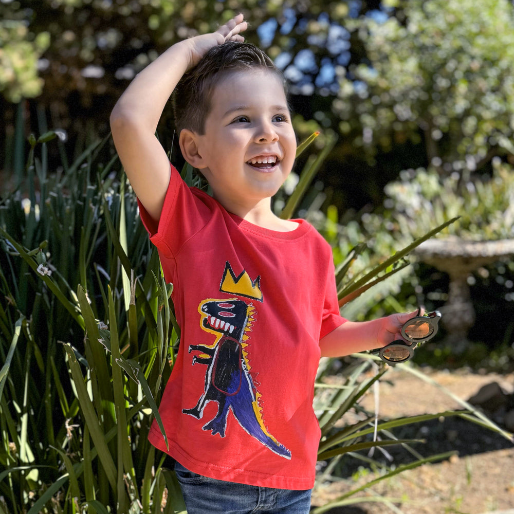 Toddler wearing t-shirt.