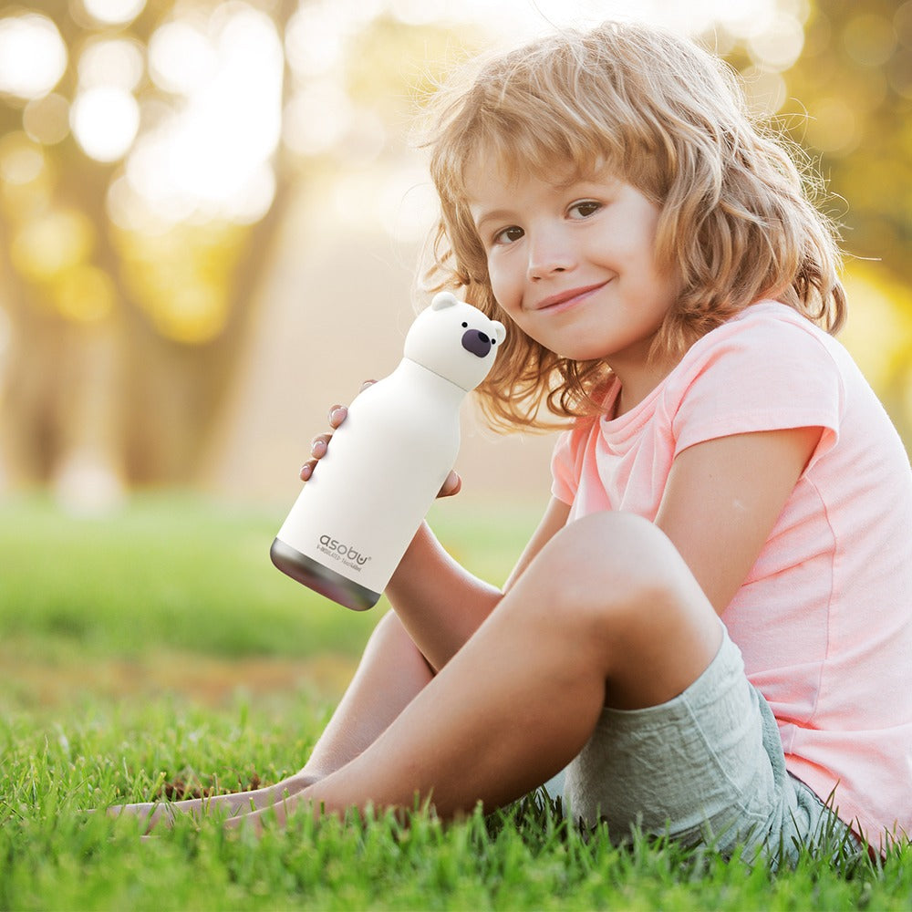 Kid holding water bottle.