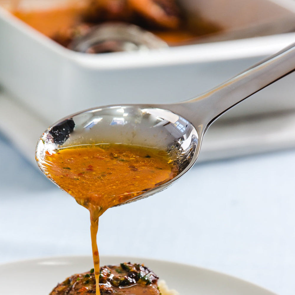 Spoon serving sauce.