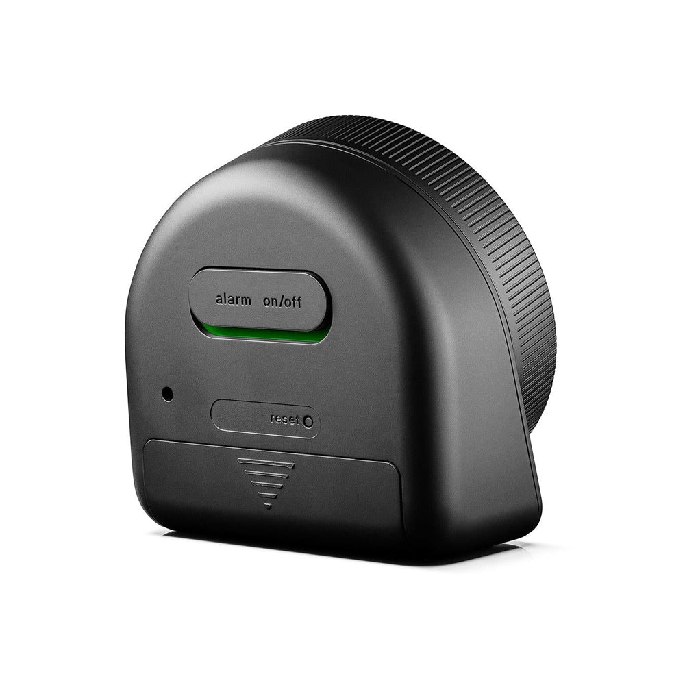Black electronic device with alarm on/off switch on a white background