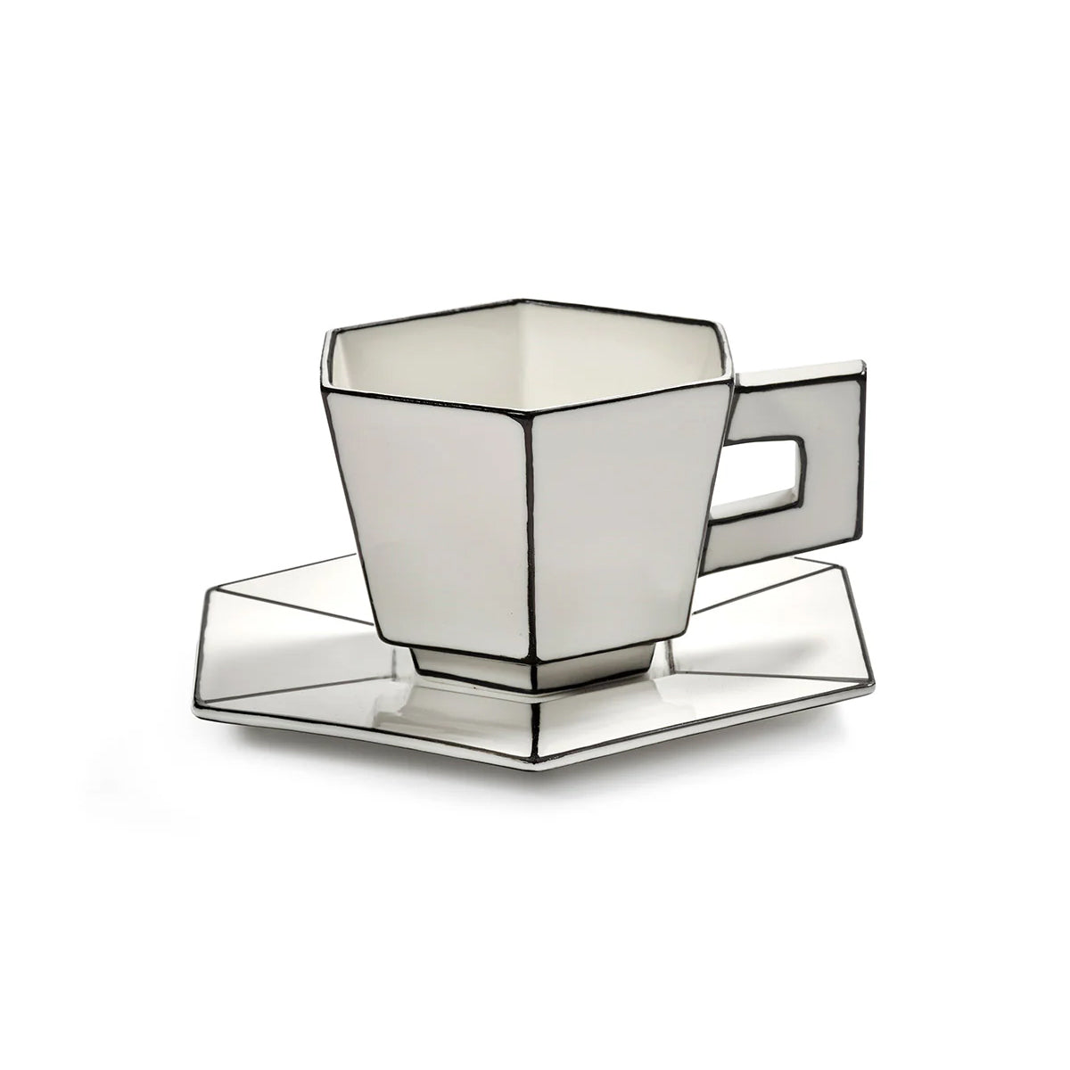 Hexagonal glass teacup and saucer on a white background