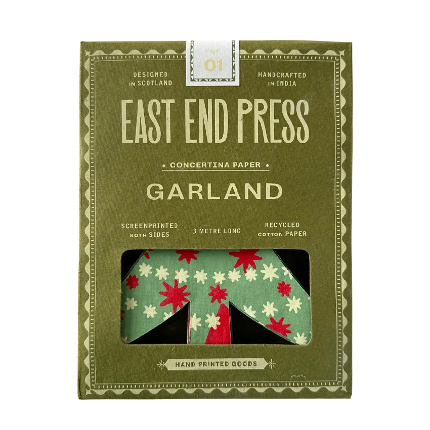 East End Press Garland Concertina Paper in a green envelope with a window showing folded patterned paper.