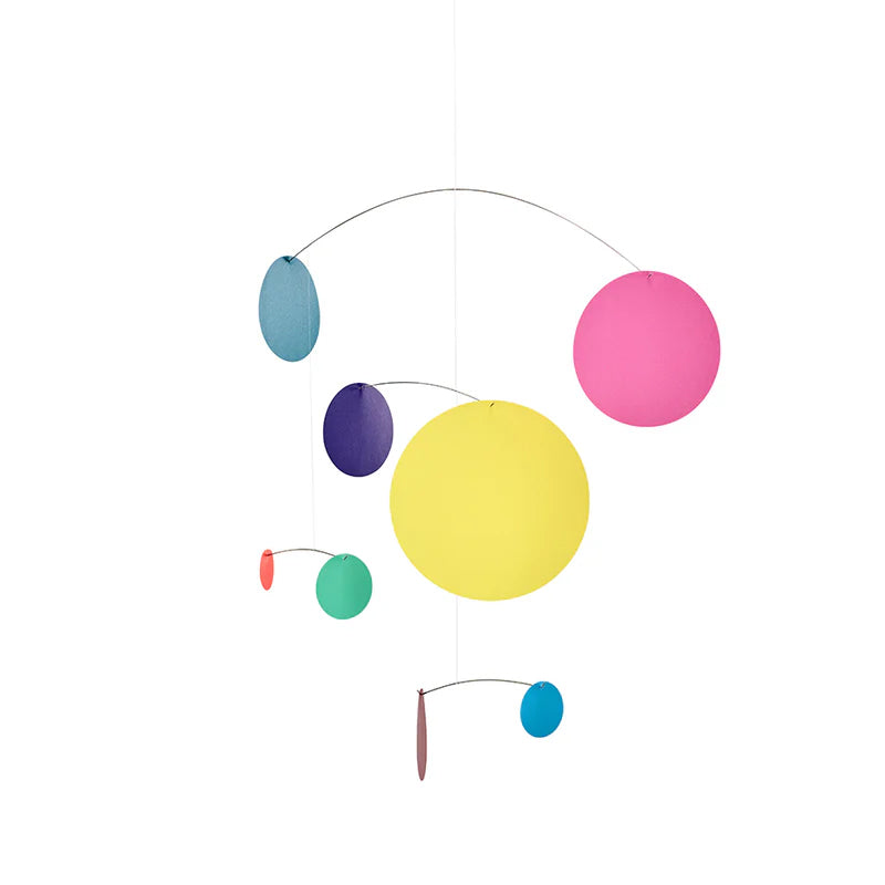 Colorful mobile with circular shapes on a white background