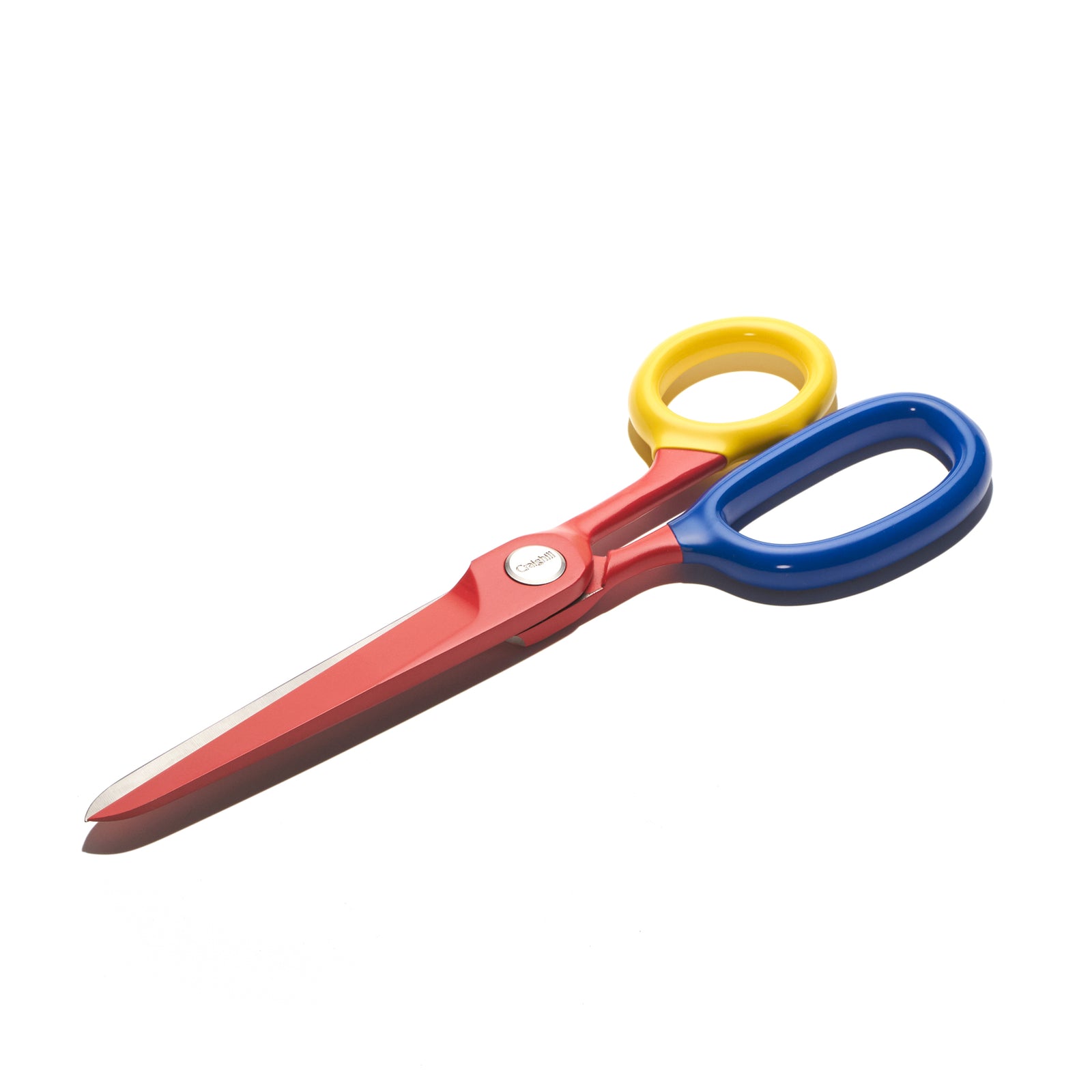 Colorful scissors with red handle, yellow pivot, and blue blades on a white background