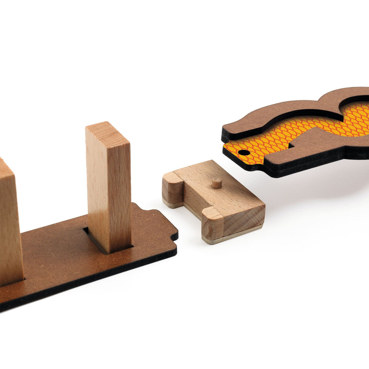 Wooden toy components on a white background